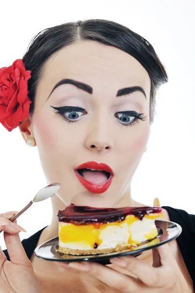 Schöne junge Frau essen süßen Kuchen — Stockfoto