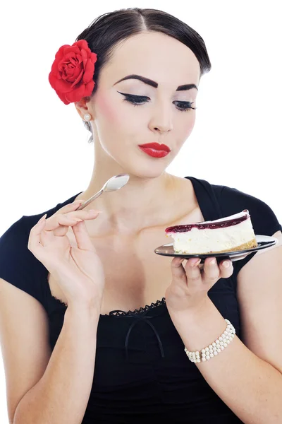Hermosa joven comer pastel dulce — Foto de Stock