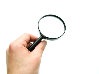 Hand with magnifying glass clipart