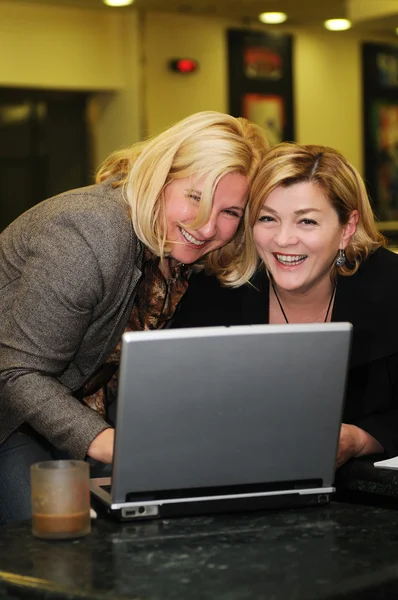 stock image Happy mature woman work on laptop