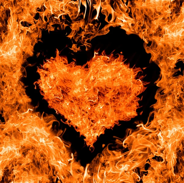 Orange heart shape fire — Stock Photo, Image