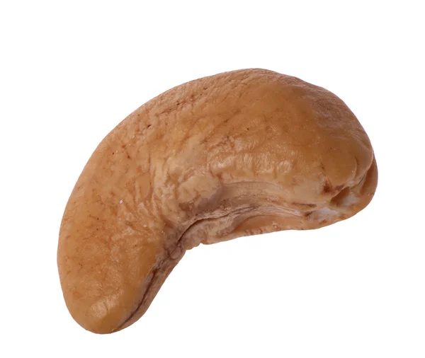Один орех кешью изолирован на белом — стоковое фото