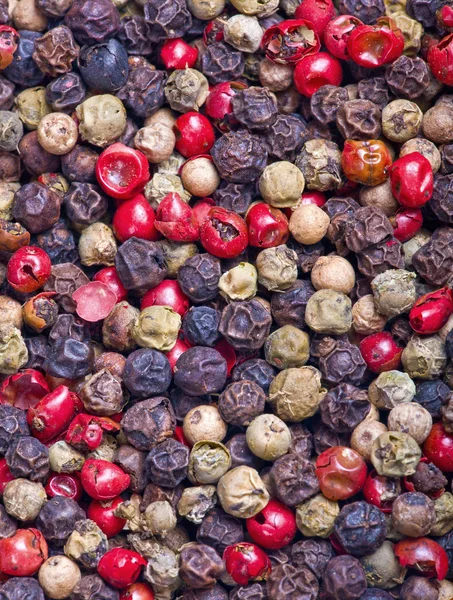 stock image Different peppercorn background