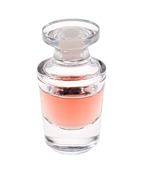 stock image Pink perfume bottle isolated on white