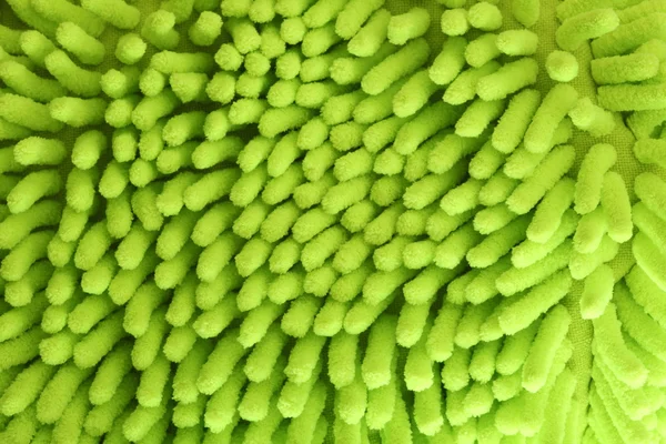 Green sponge mitt background — Stock Photo, Image