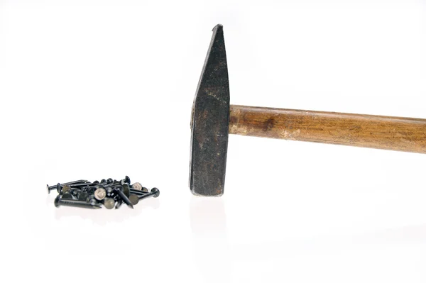Hammer nails on white background — Stock Photo, Image