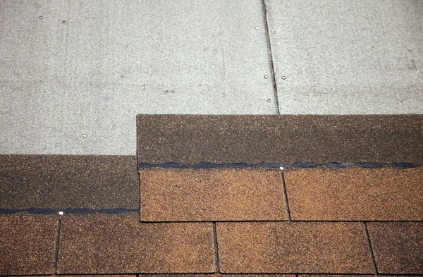 Brown asphalt roofing shingles. — Stock Photo, Image