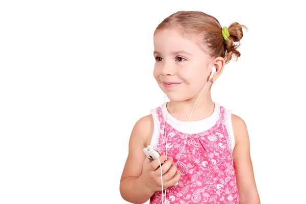 Little girl listening music on phone — Stock Photo, Image