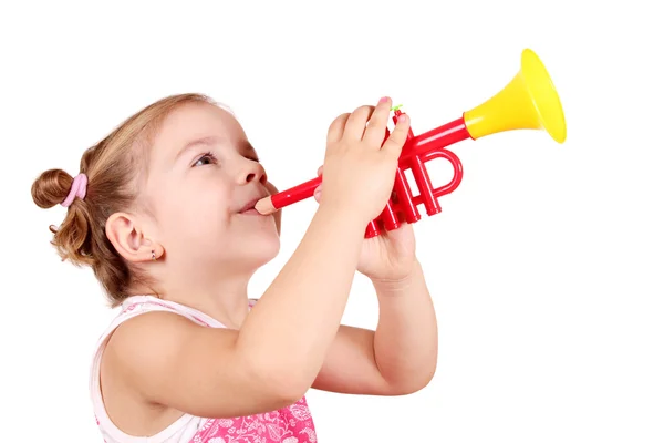 Beauty little girl play trumpet — Stock Photo, Image