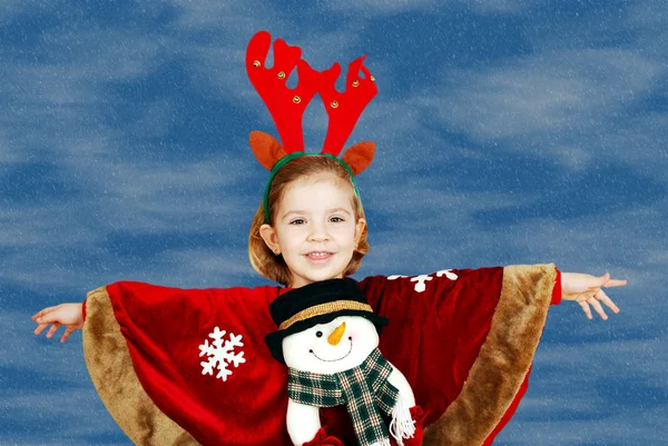 Schönes kleines Mädchen mit Hirschrudolf Horn auf dem Kopf — Stockfoto