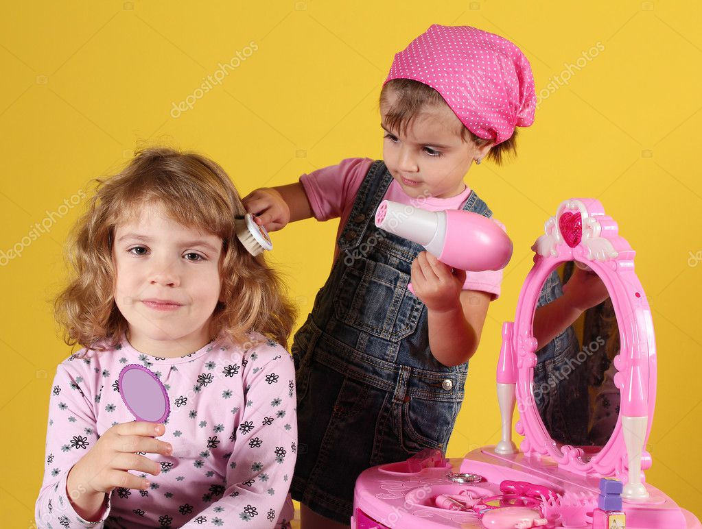 Little girls play hairdressers Stock Photo by ©goceristeski 7759827