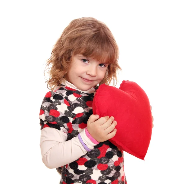 Beauty little girl holding big red heart — Stock Photo, Image