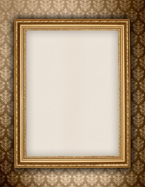 Golden frame on wallpaper background clipart