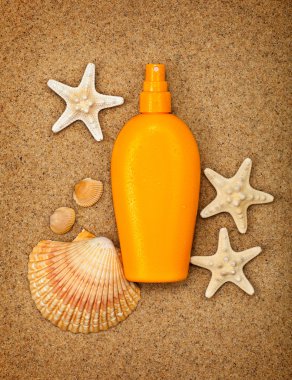 Summer beach - suntan oil clipart