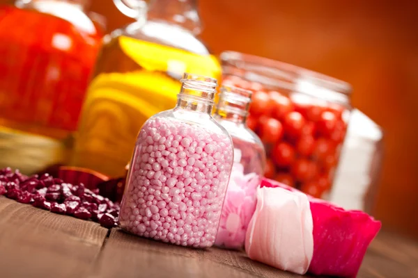 Pink bath salt and oils — Stock Photo, Image