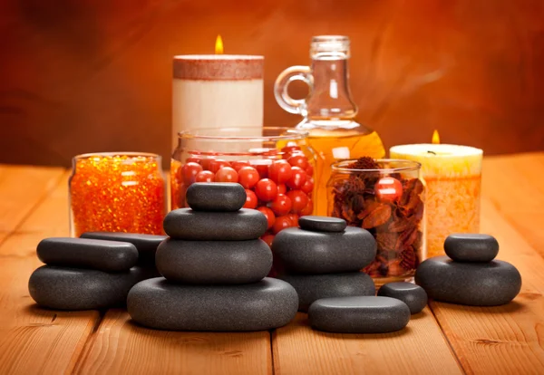 Spa supplies - essential oil, bath salt and massage stones — Stock Photo, Image