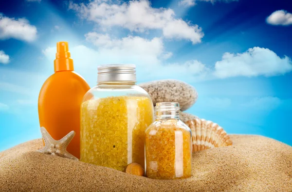 Sunbath - suntan oil and spa minerals — Stock Photo, Image