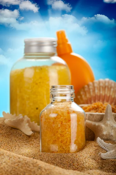 Sunbath - suntan oil and bath salt — Stock Photo, Image