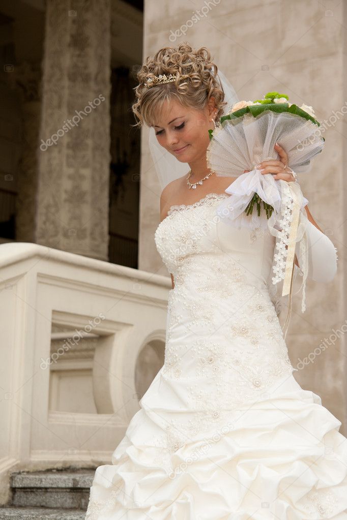 The beautiful bride with a bouquet