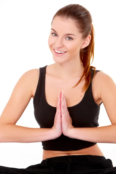 Portrait of pretty young woman doing yoga — Stock Photo, Image