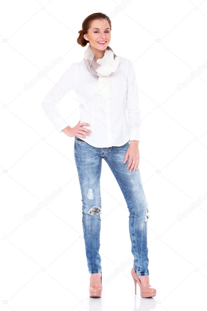 Young sexy brunette woman in white shirt and blue jeans — Stock Photo ...
