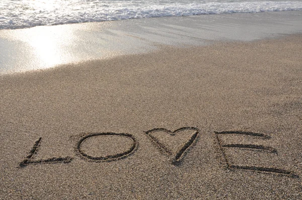 Love - drawn in the sand — Stock Photo, Image