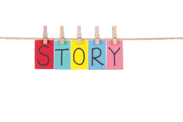Verhaal, houten pen en kleurrijke woorden — Stockfoto