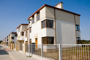 Row of new houses clipart