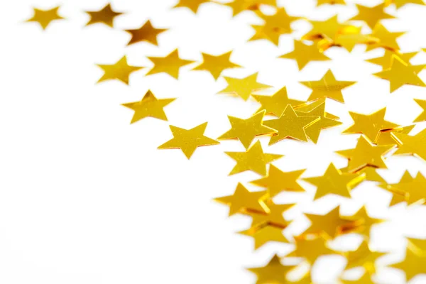 Decoração de Natal de estrelas douradas confetti — Fotografia de Stock