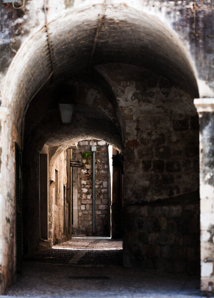Sidewalk in historic Dubrovnik, Croatia. Focus somewhere at the middle.