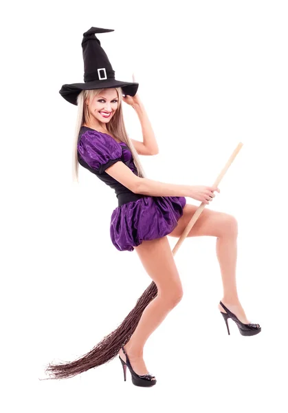 Witch with a broom — Stock Photo, Image