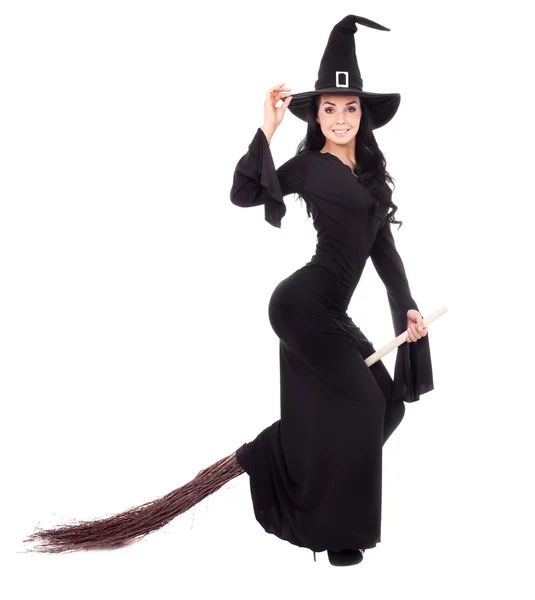 Witch with a broom — Stock Photo, Image