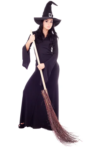 Witch with a broom Stock Picture
