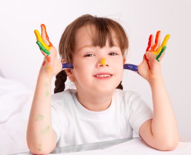 Girl painting with watercolor