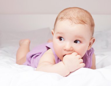 Baby in bed clipart