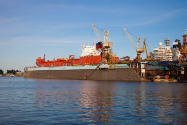 On the dock at the shipyard clipart