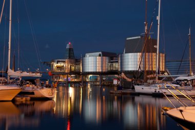 Stavanger harbor at night clipart