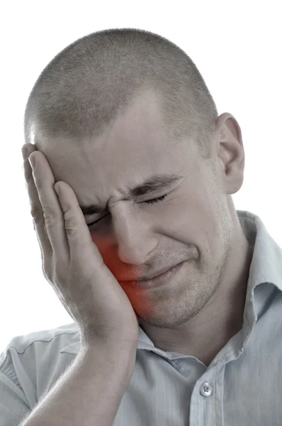 Män hålla huvud i tand smärta isolerade — Stockfoto