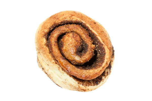 Pão doce com canela isolada no fundo branco. vista superior — Fotografia de Stock