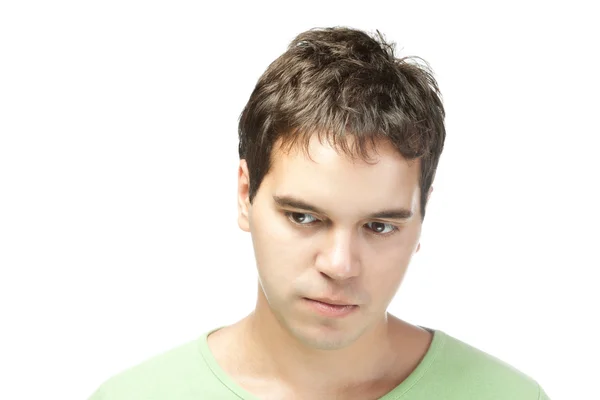 Portret van triest jonge man geïsoleerd op witte achtergrond — Stockfoto