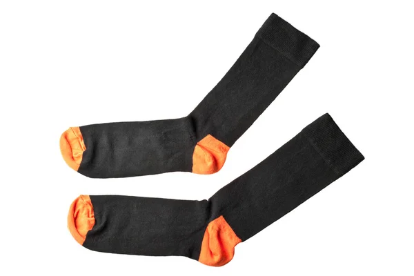 Dvojice černé a oranžové ponožky izolovaných na bílém pozadí — Stock fotografie