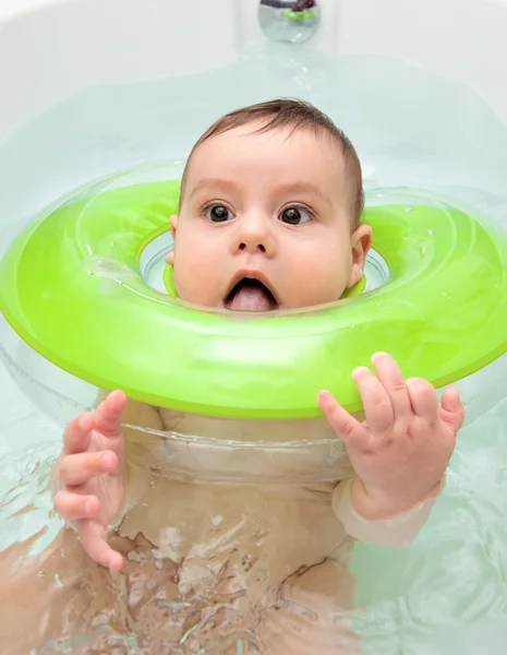 stock image The emotional delightful child taking a bath