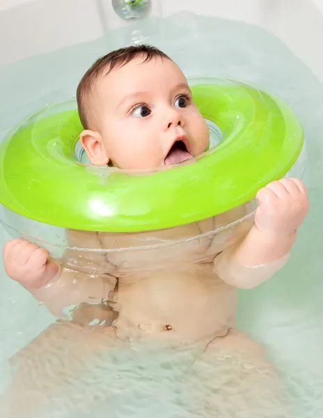 stock image The emotional delightful child taking a bath