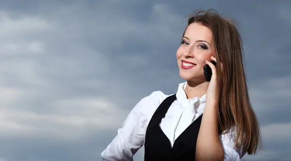 Businesswoman with cellphone — Stock Photo, Image
