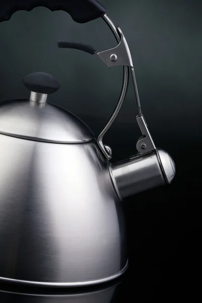 Tea kettle over dark background — Stock Photo, Image
