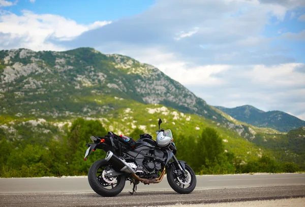 stock image Modern motorbike on the road border