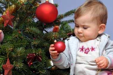 Little baby and Christmas tree clipart