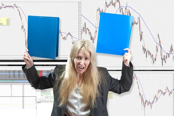 stock image The upset business woman a financial analyst against falling of courses of