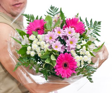 Brawny man's hand with a bouquet of flowers clipart