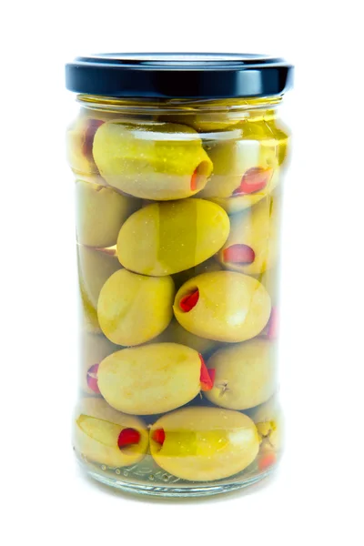 Glass jar with tinned olives — Stock Photo, Image